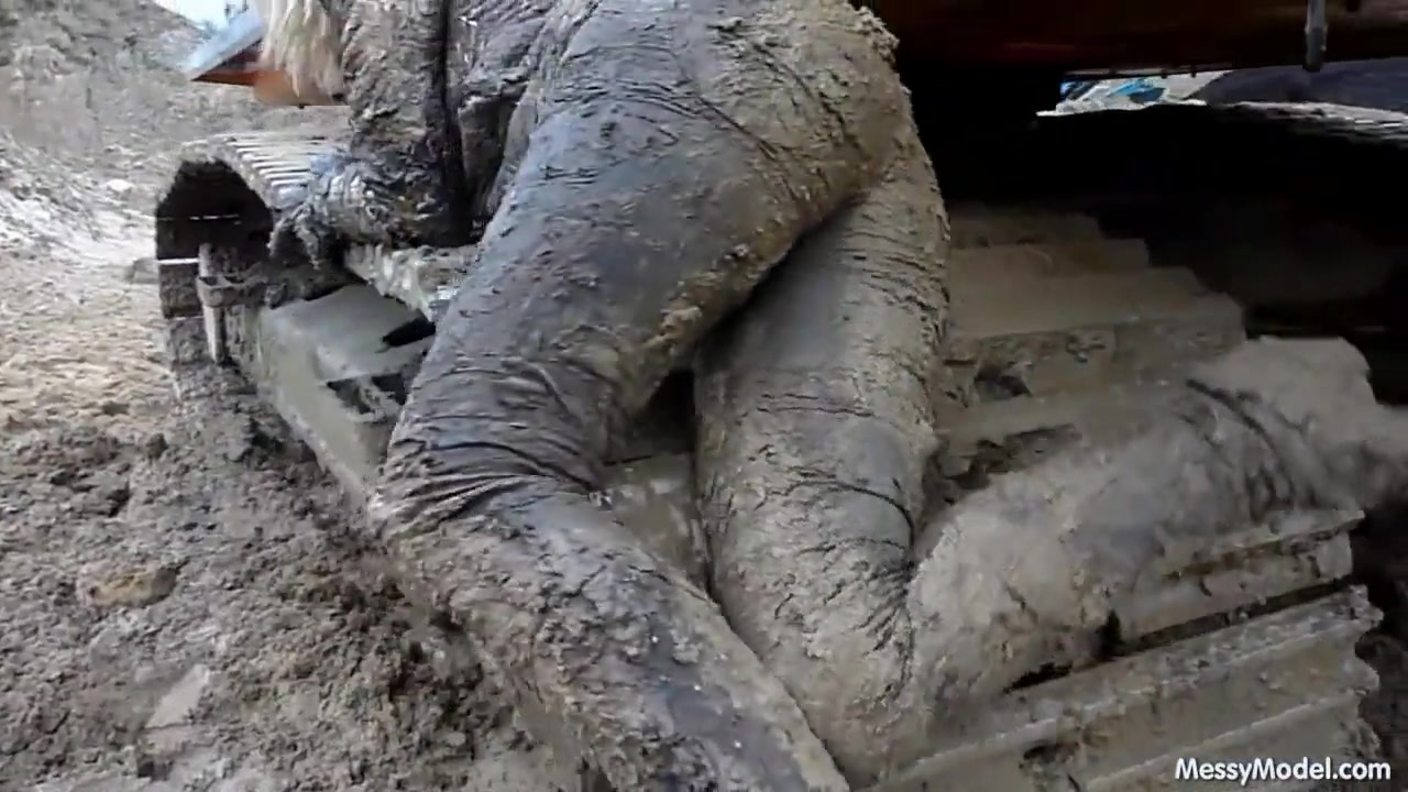 Girl plays in mud