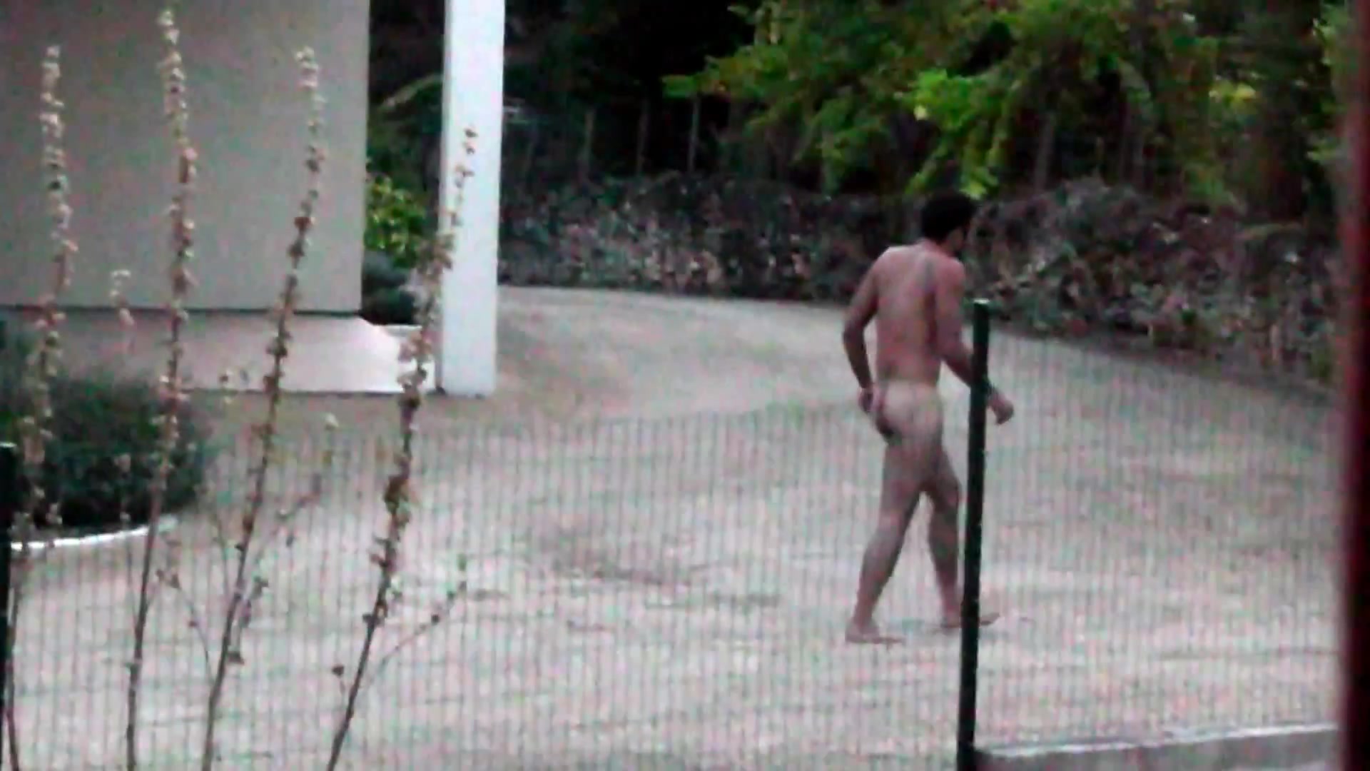 nude man in garden