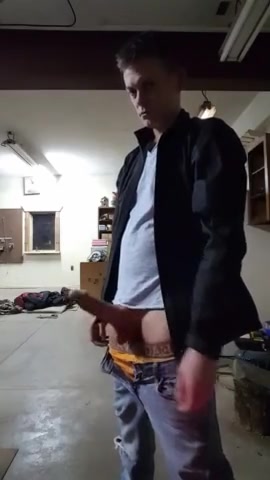 very hung dude jerks off and licks up his cum
