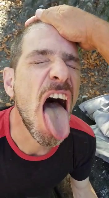Daddy taking cock and spit in the woods