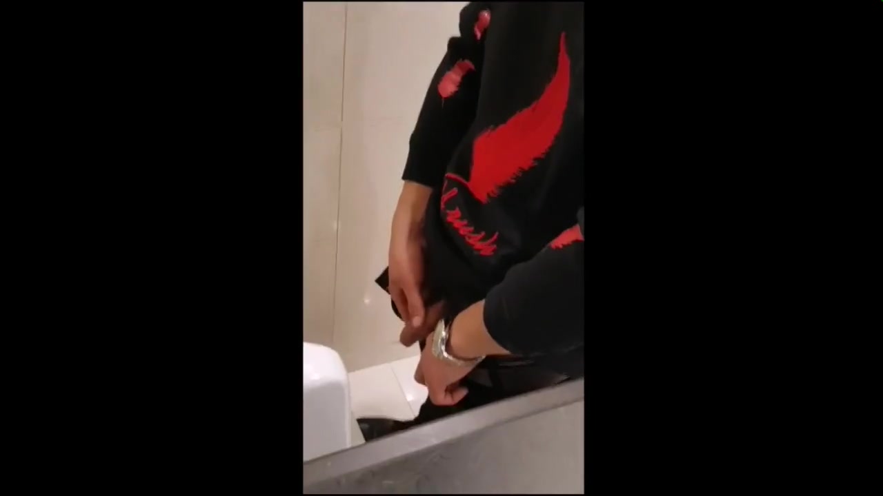 SPYING HOT YOUNG CHINESE AT URINAL 2