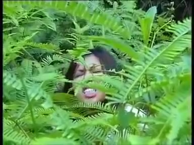 Malay woman in forest diarrhea scene