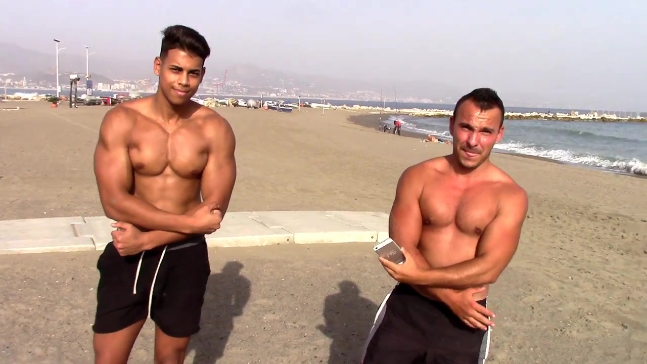 Flexing on the beach - video 2