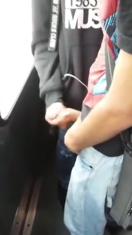Lad milked a load by a mate on a train