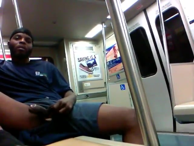 playing with his cock on the subway
