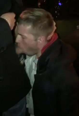 Bloke Gets Curbside Head on a Rainy Night