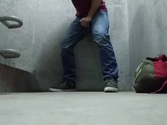 Pissing jeans in stairwell of apartment building