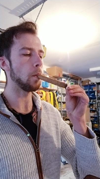 Young cigar inhaler