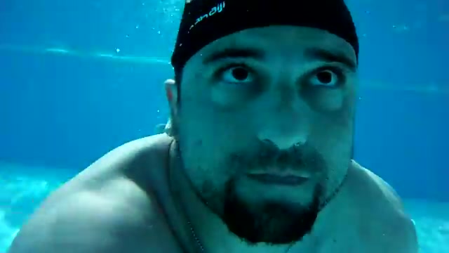 Hairy hottie barefaced underwater in pool