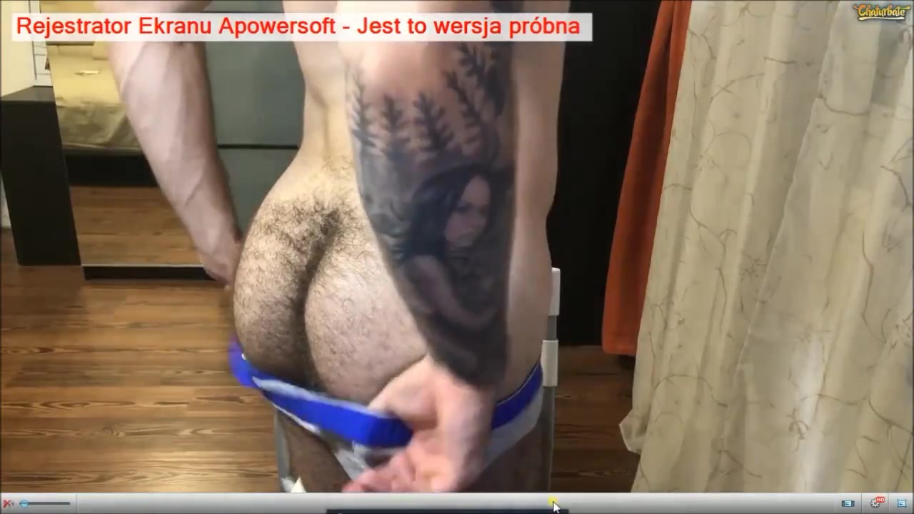 Tattooed guy shows off hairy ass and crack