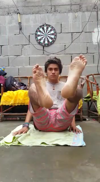 Oiled Boy Feet In Flip Flops