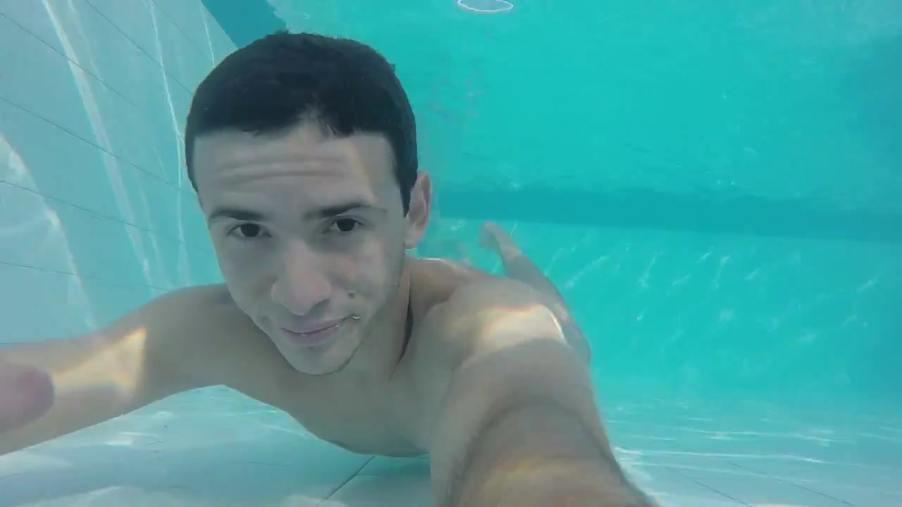 Barefaced cutie swimming barefaced underwater