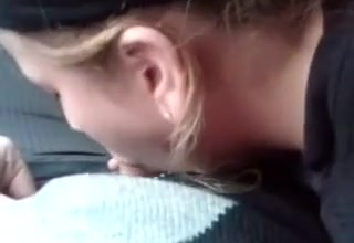 pretty blonde teen giving oral service in car