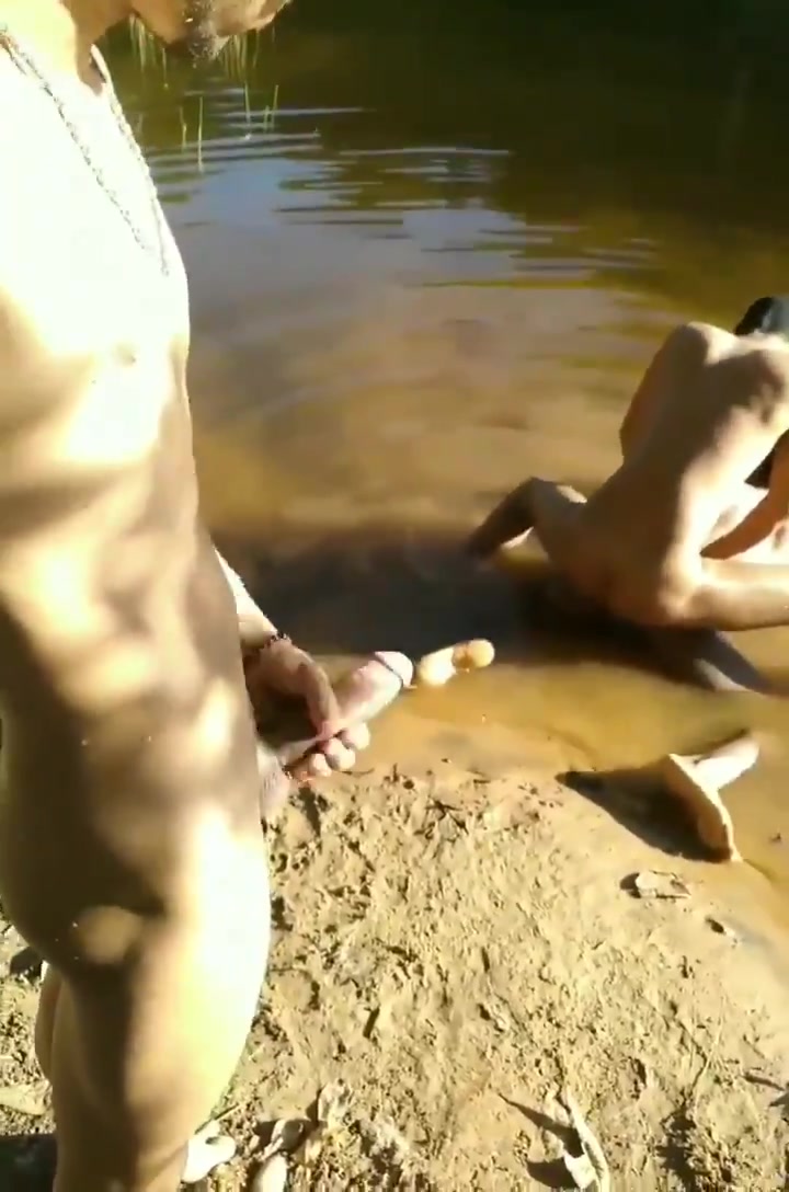Skinny twinks fuck in dirty lake