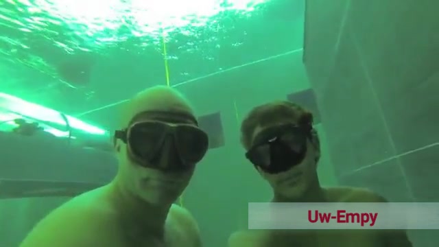 Italian freedivers underwater in tight speedos