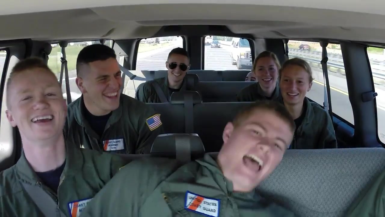 U.S. Coast Guards sing in van