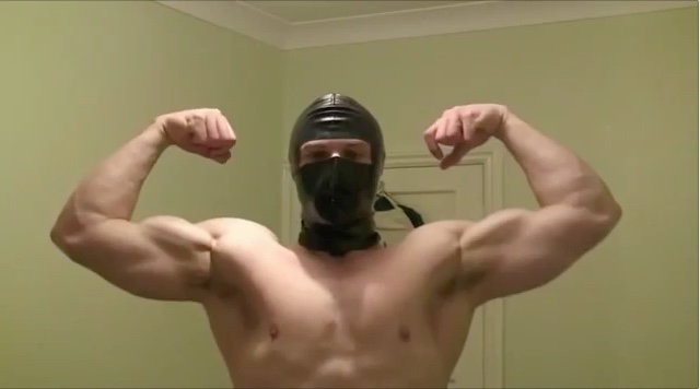 Brit muscle boy with latex mask