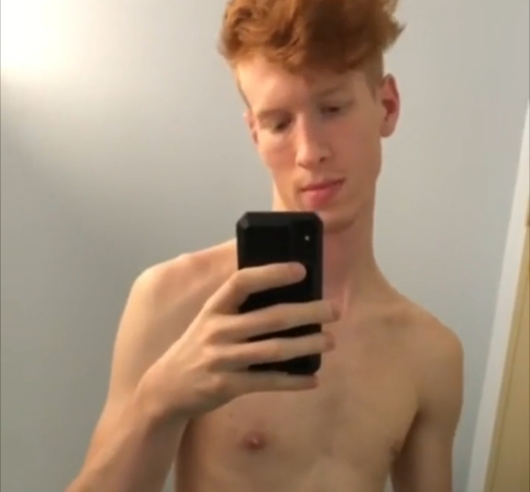 Ginger twink shoots a load in the bathroom