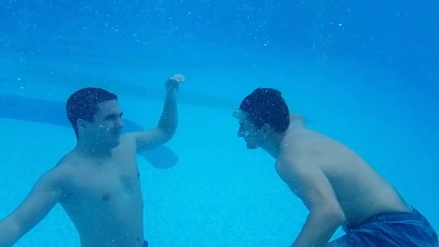Fighting barefaced underwater in pool
