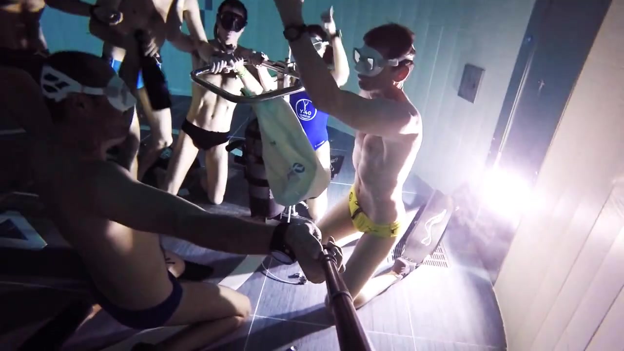 Spanish freedivers breatholding underwater in tank