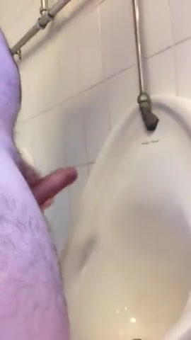 Naked pig plays all over men\
