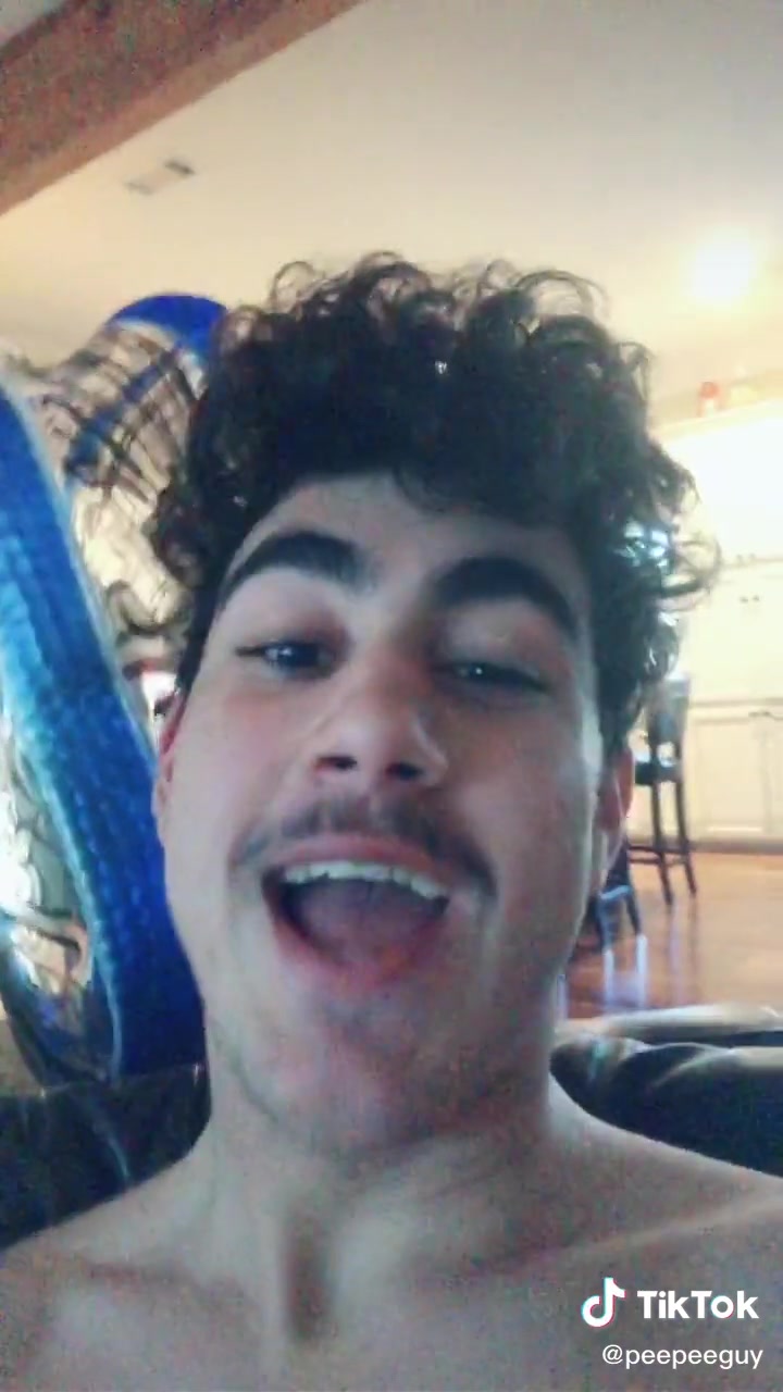 Alpha male smells his balls