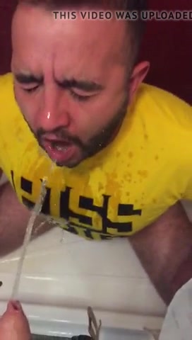 Piss pig in yellow t-shirt soaked