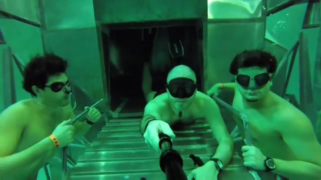 Buddies breatholding underwater