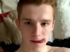 Legs back so he can lick the tip of his ginger cock