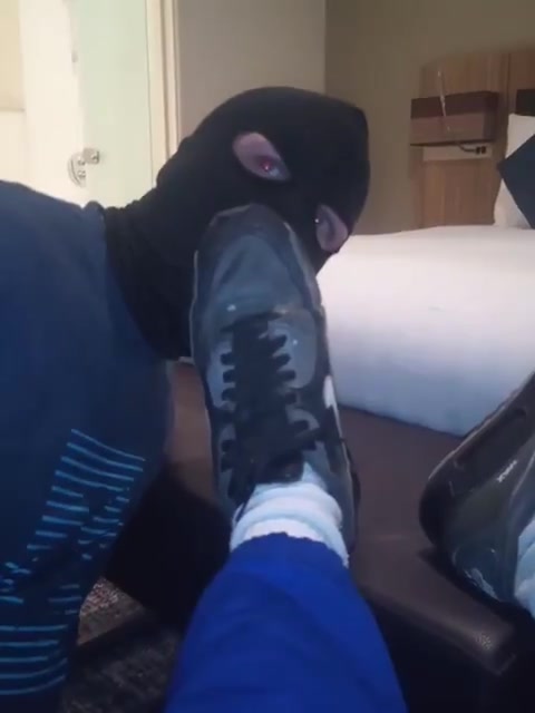 A fag licks clean his Master's Nike sneakers