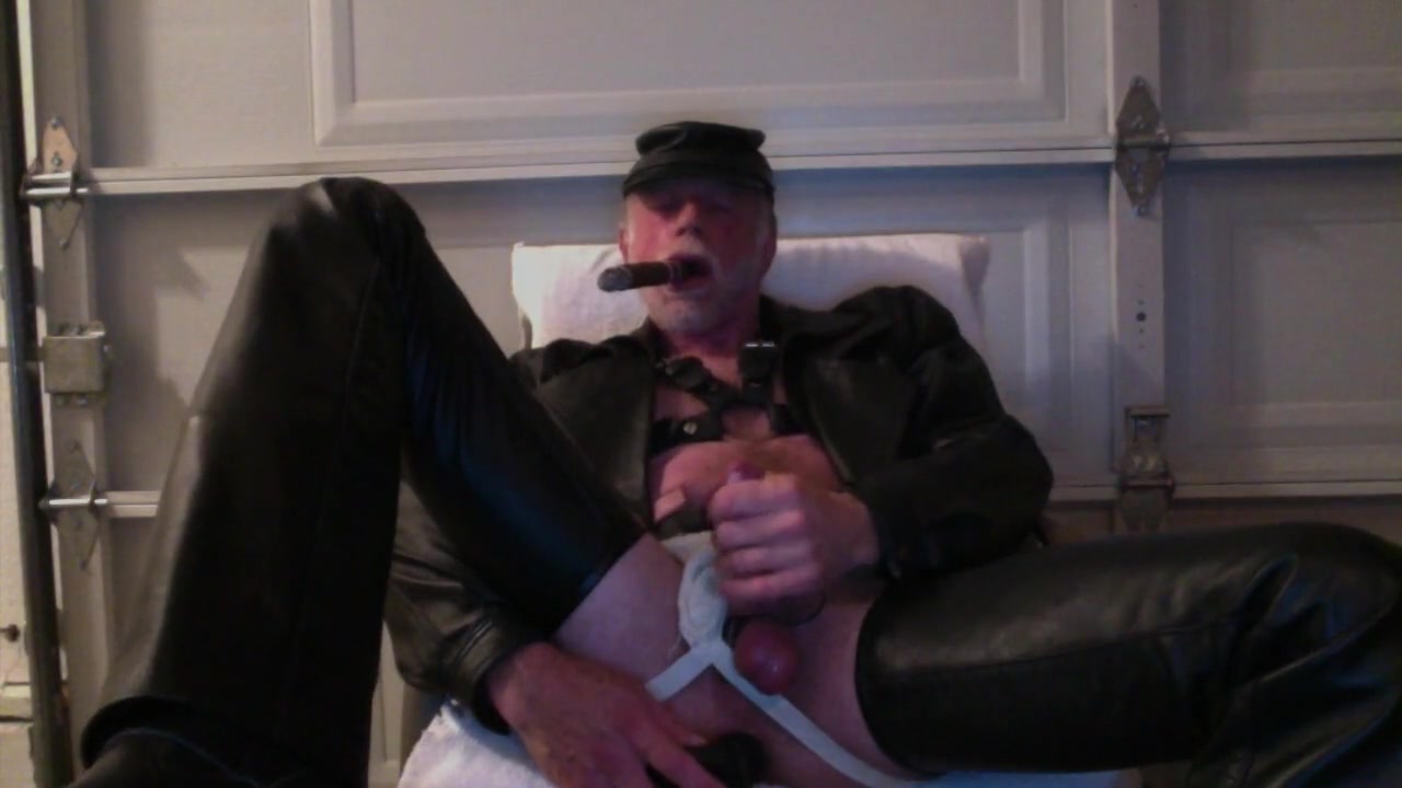Leather daddy smokes, strokes and fucks his hole until he cums!