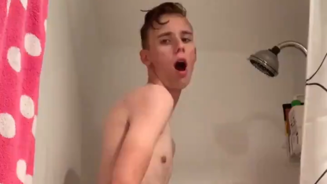 Slim twink goes balls deep on dildo in the shower