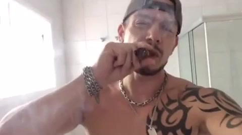Hot man smoking - video 2