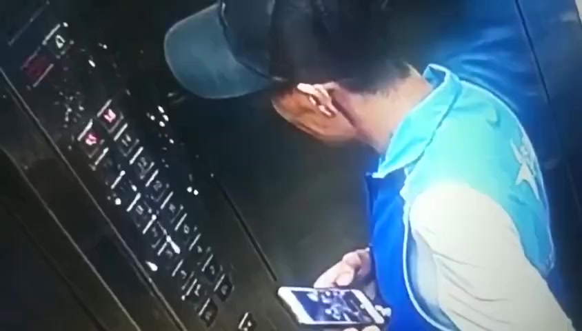 Chinese guy chain spit on elevator keyboard