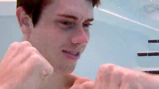 Goofing barefaced underwater in pool