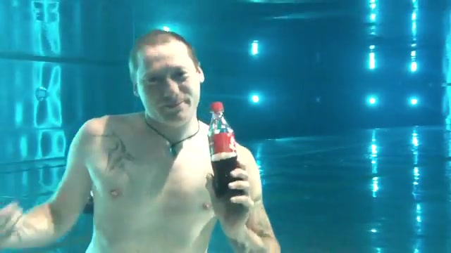 Merman drinking barefaced underwater