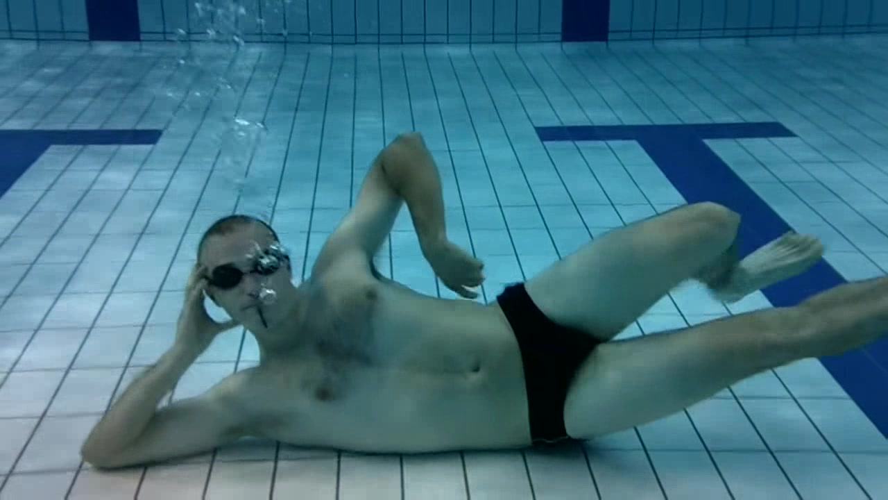 French swimmers underwater in bulging speedos