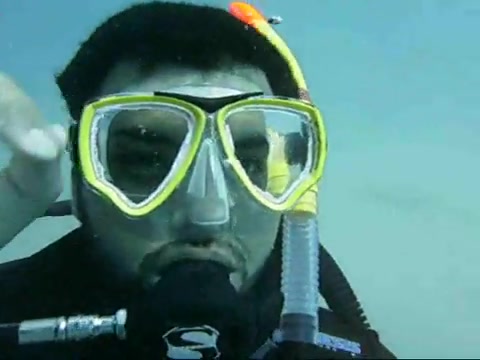 Arab scubadivers barefaced underwater