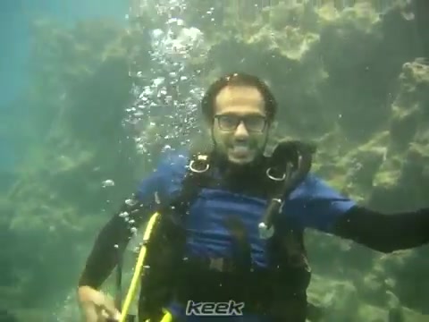 Barefaced scubadiver underwater in sea