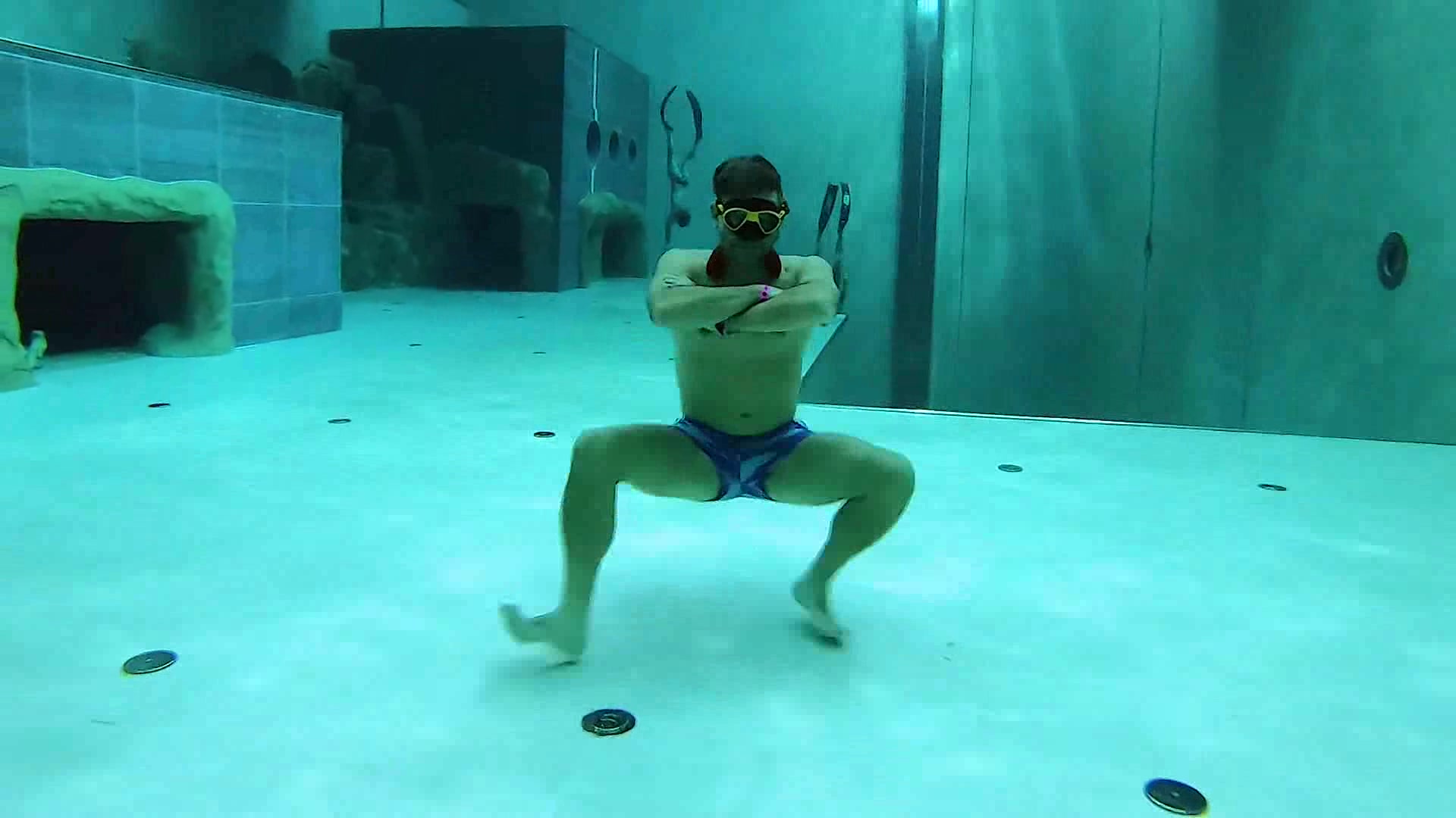 Goofing freedivers breatholding underwater