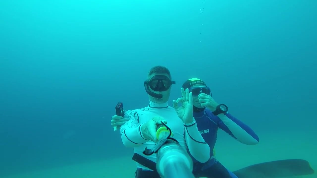 Freediving buddies breatholding underwater