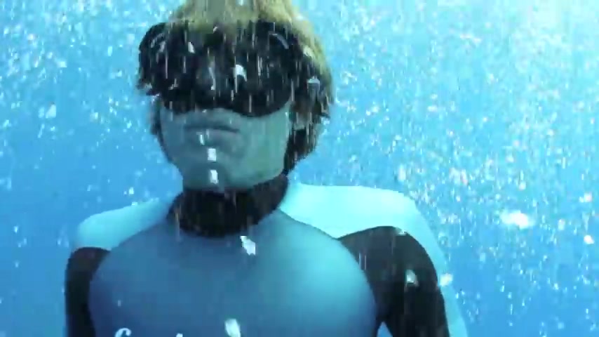 Guillaume N breatholding underwater in tight wetsuit