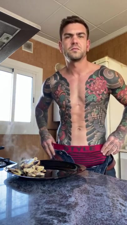 Horny inked stud in kitchen (no cum)