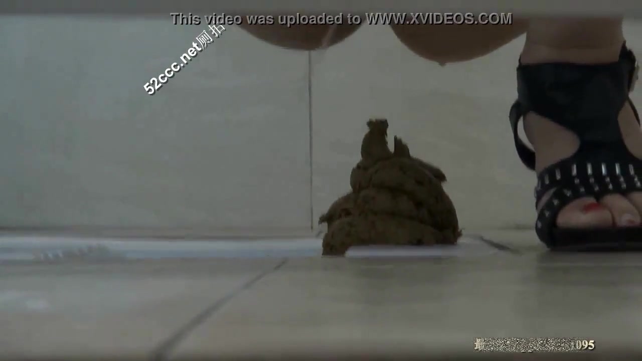 Voyeured woman poops in the floor in a Chinese toilet