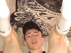 Twink fingers his smooth pink hole