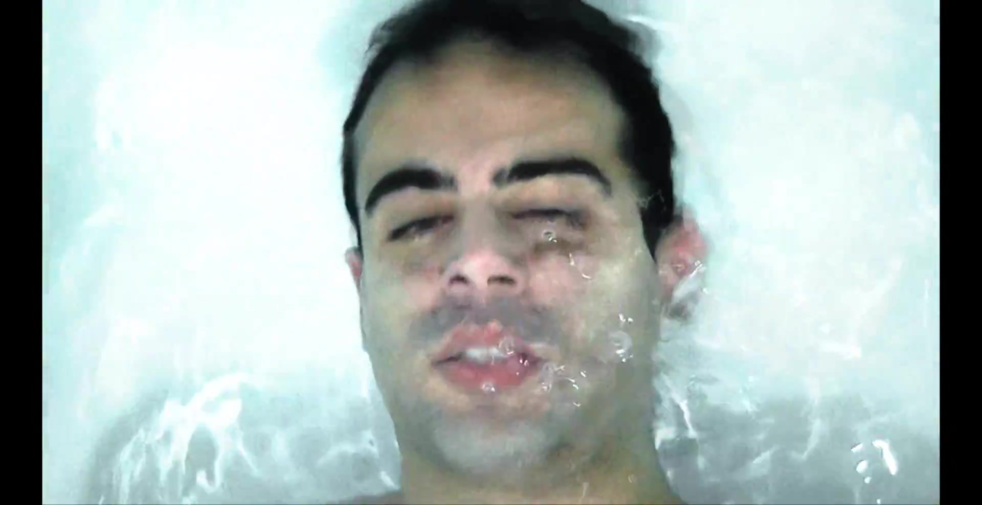 Singing barefaced underwater in tub