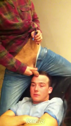 Drunk lad gets mate's cock in his face