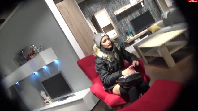 Piss on a sofa in a public store