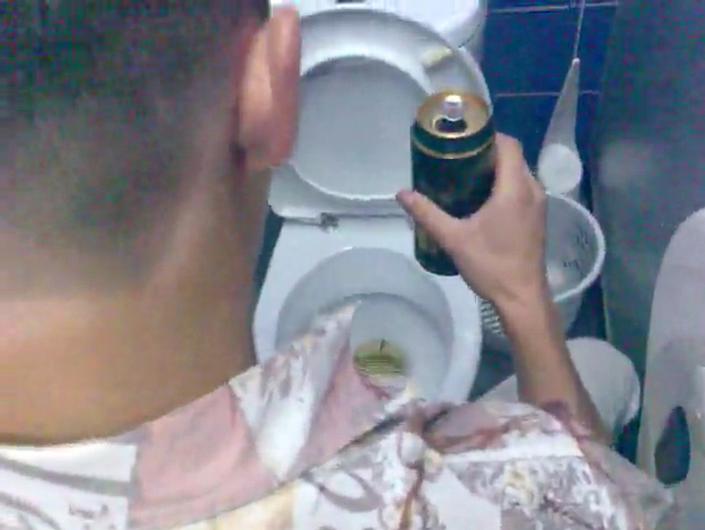 Drunk friend pissing while sitting