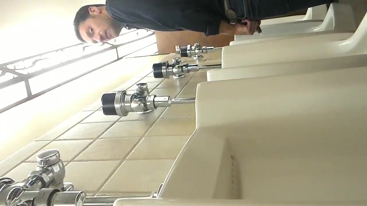 SPYING HOT GUYS AT THE URINAL 4 - video 2